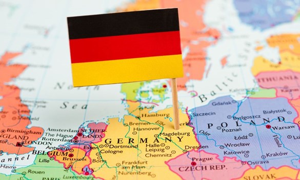 German national flag pinned into a map showing surrounding countries